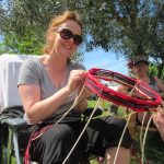artist making a lampshade outdoors